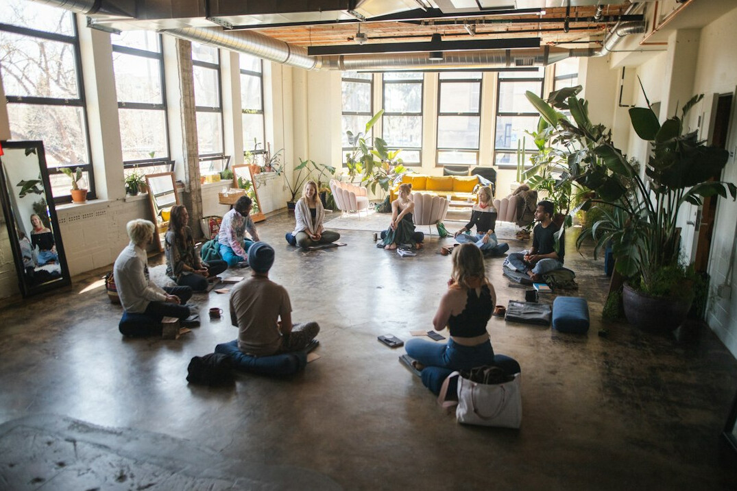 employees participating in yoga class