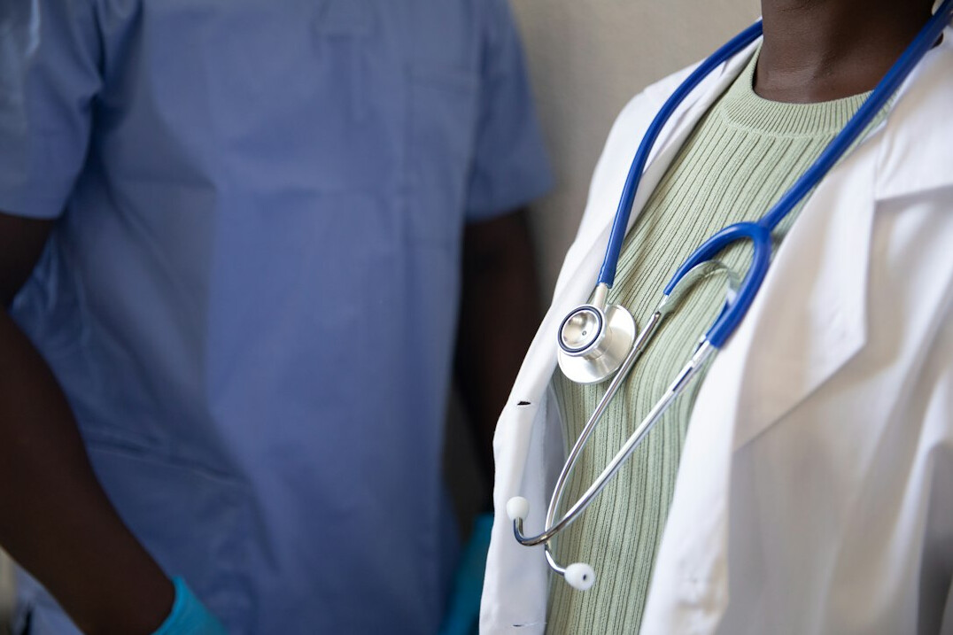 Diverse team of corporate health professionals standing together