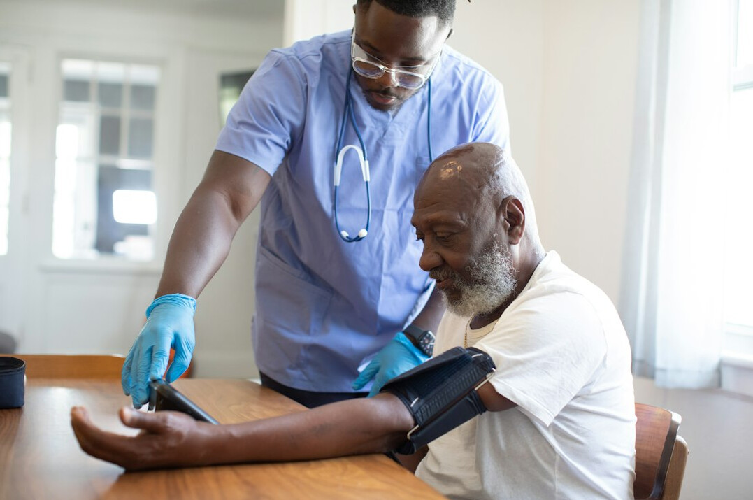 Doctor performing a preventive health checkup on a patient
